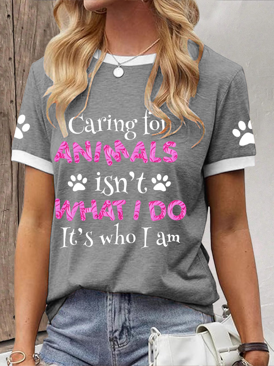 Women's caring for animals isn't what I do it's who I am T-shirt