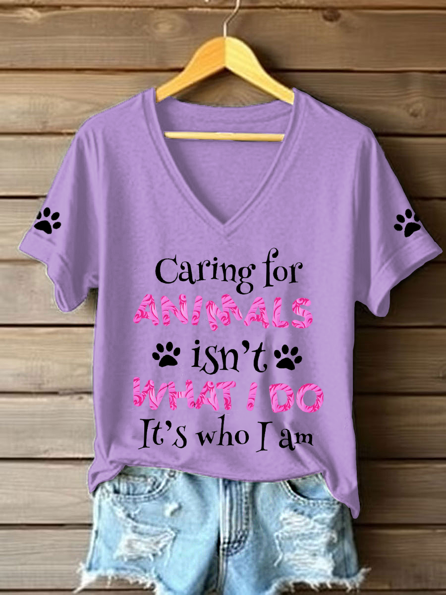Women's caring for animals isn't what I do it's who I am V-neck T-shirts