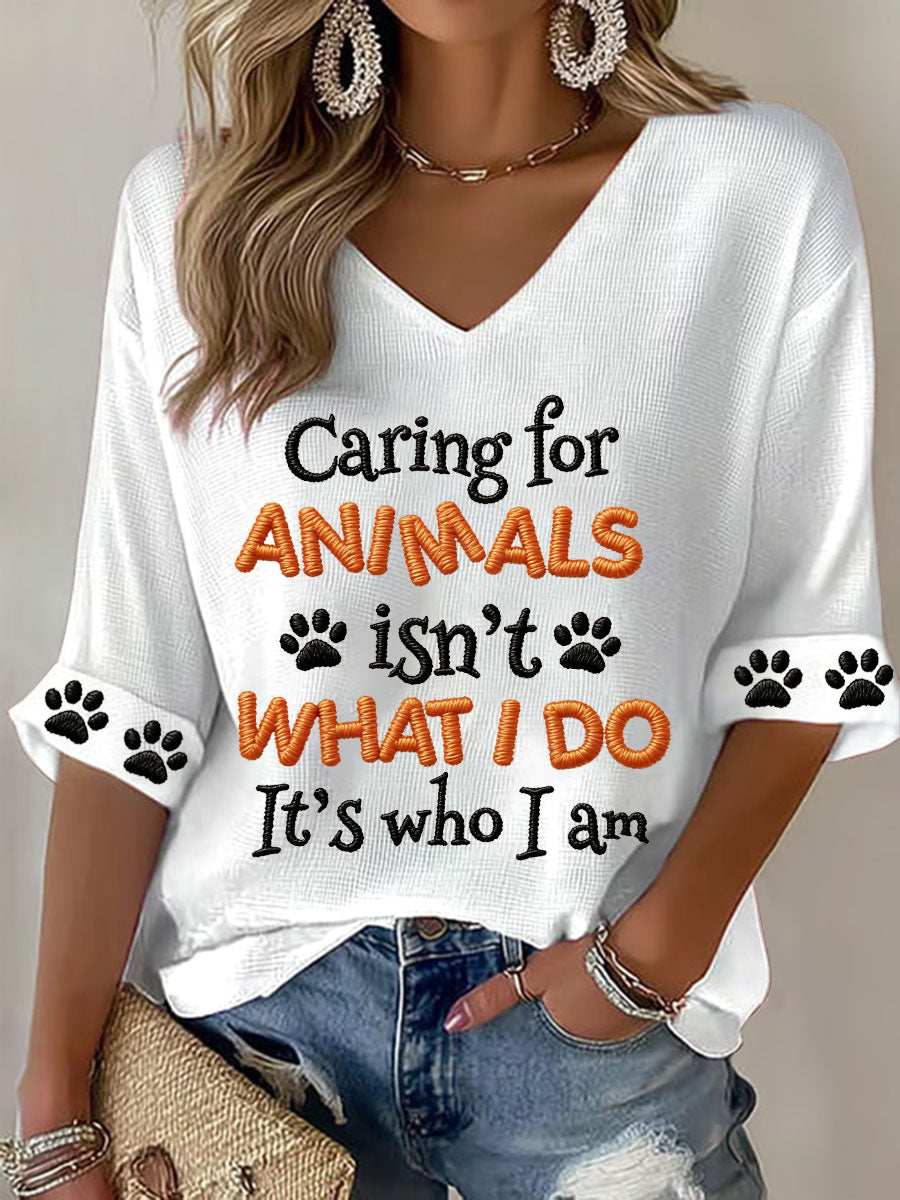 Women's "Caring for animals isn't what I do, it's who I am" V-neck Tops