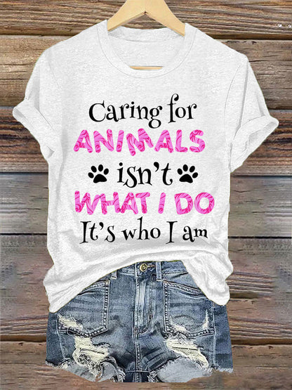 Women's caring for animals isn't what I do it's who I am T-shirt