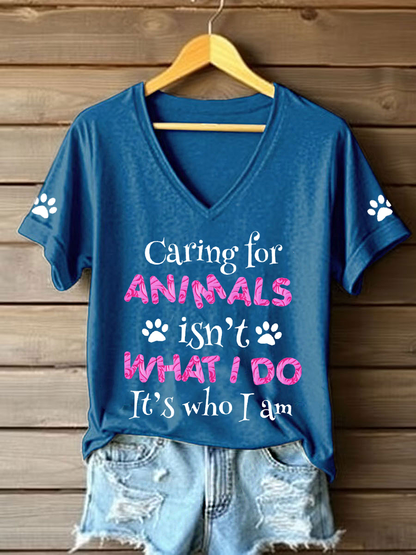 Women's caring for animals isn't what I do it's who I am V-neck T-shirts