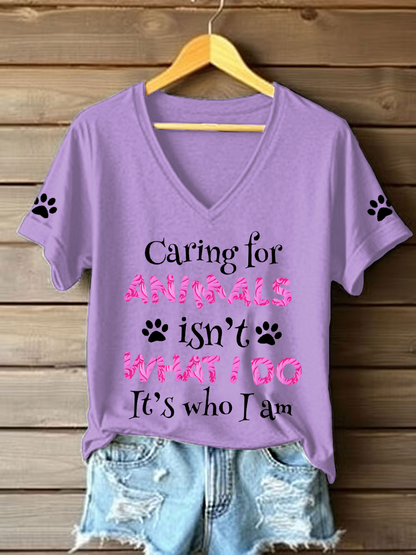 Women's caring for animals isn't what I do it's who I am V-neck T-shirts